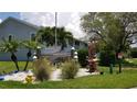 Entrance sign for Isle of Capri with dolphin statue at 255 Capri N Cir # 17, Treasure Island, FL 33706