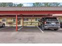 Covered carport parking with designated spots and ample space for vehicles at 601 N Hercules Ave # 503, Clearwater, FL 33765