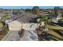 An aerial view of a house with a two-car garage at 2029 Inverness Greens Dr # 2029, Sun City Center, FL 33573