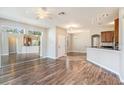 Bright living room with hardwood floors and kitchen views at 2029 Inverness Greens Dr # 2029, Sun City Center, FL 33573