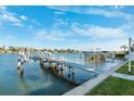 Private dock with multiple boat slips on a calm waterway at 2601 Bay Blvd, Indian Rocks Beach, FL 33785