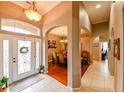 Bright and spacious entryway with views into the dining room and hallway at 3407 Walden Reserve Dr, Plant City, FL 33566