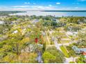 Wide lot near the water, showcasing the home's peaceful setting at 505 Jefferson S Ave, Oldsmar, FL 34677
