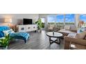 Living room with water views and plenty of natural light at 670 Island Way # 500, Clearwater Beach, FL 33767