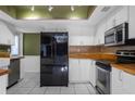 Updated kitchen featuring stainless steel appliances at 705 Whiteway Dr, Brooksville, FL 34601