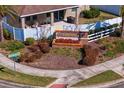 Community entrance sign for Barrington with landscaping and street view at 13614 Tonya Anne Dr, Riverview, FL 33579