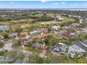 Property location shown with neighborhood context and golf course views at 150 Almedo Ne Way, St Petersburg, FL 33704