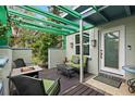 Outdoor patio features a fire pit and seating area at 200 57Th S Ave, St Petersburg, FL 33705