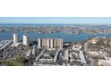 Aerial view showing a high-rise building near the water at 7050 Sunset S Dr # 211, South Pasadena, FL 33707