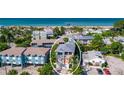 Attractive three-story house close to the beach, in a vibrant neighborhood at 206 Church Ave, Bradenton Beach, FL 34217