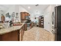 Spacious kitchen with stainless steel appliances and granite countertops at 2424 Dakota Rock Dr, Ruskin, FL 33570