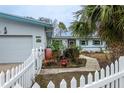 Charming single story home with a white picket fence at 2744 45Th S St, Gulfport, FL 33711