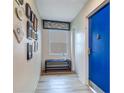 Bright entryway with stylish decor and a blue door at 841 4Th Avenue N # 67, St Petersburg, FL 33701