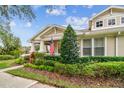 Attractive home exterior, showcasing landscaping and walkway at 10002 Bentley Way, Tampa, FL 33626