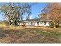 Ranch style home with spacious yard and mature trees at 1758 Winfield Cir, Clearwater, FL 33756