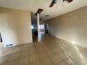 Bright living room with tile floors and a view into the kitchen at 4617 49Th N Ave, St Petersburg, FL 33714