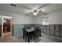 Dining area with a table and chairs, undergoing renovations at 605 Shore E Dr, Oldsmar, FL 34677