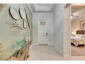 Bright entryway with view into bedroom at 17219 Scuba Crest St, Wimauma, FL 33598