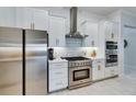 Modern kitchen with stainless steel appliances at 17219 Scuba Crest St, Wimauma, FL 33598