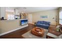 Cozy living room with hardwood floors and comfortable seating at 1742 Bayshore Blvd, Dunedin, FL 34698