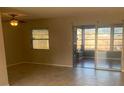 Bright living room with tile floors and sliding glass doors at 8757 113Th St, Seminole, FL 33772