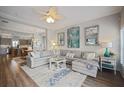 Spacious living room with light gray sectional sofa at 946 Highland Ave # 1, Dunedin, FL 34698