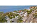 Aerial view of waterfront property, showing its location and proximity to the water at 1101 Victoria Dr # 16, Dunedin, FL 34698