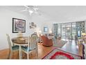 Bright dining area with table and chairs at 12200 Vonn Rd # 1106, Largo, FL 33774