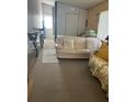 Spacious living area with couches and bicycles at 12501 Ulmerton Rd # 140, Largo, FL 33774