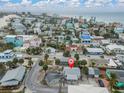 Aerial view of beach home and neighborhood at 137 91St Ave, Treasure Island, FL 33706