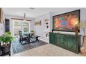 Charming dining area with a marble-top table and built-in shelving at 4080 35Th N Ave, St Petersburg, FL 33713