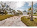 Exterior view showing the house's front and landscaping at 4317 Overlook Ne Dr, St Petersburg, FL 33703