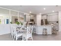 Spacious kitchen with stainless steel appliances and granite countertops at 683 157Th E Ct, Bradenton, FL 34212
