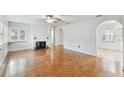 Living room with hardwood floors and fireplace at 10308 Forest Hills Dr, Tampa, FL 33612