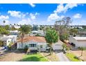 House with a spacious yard, located in a residential neighborhood at 1145 Boca Ciega Isle Dr, St Pete Beach, FL 33706