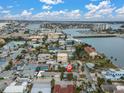 Aerial view highlighting the property's waterfront location at 130 90Th Ave, Treasure Island, FL 33706