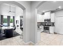Modern kitchen with white cabinets and stainless steel appliances at 2146 Laceflower Dr, Brandon, FL 33510
