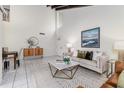 Spacious living room with high ceilings, exposed beams, and tiled floors at 2736 Haverhill Ct # 2736, Clearwater, FL 33761