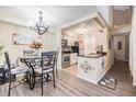 Kitchen and dining area with chandelier and modern decor at 3270 Haviland Ct # 304, Palm Harbor, FL 34684