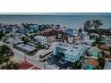 Aerial view showing teal building and beach location at 8200 Bayshore Dr # 1, Treasure Island, FL 33706