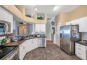 Spacious kitchen with stainless steel appliances and granite countertops at 12308 Adventure Dr, Riverview, FL 33579