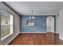 Bright dining area with hardwood floors and a view to kitchen at 15406 Peach Stone Pl, Ruskin, FL 33573