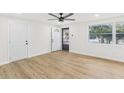 Bright living room with light wood floors at 4215 E Paris St, Tampa, FL 33610
