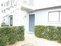 Condo exterior with gray siding and a private entrance at 6033 34Th W St # 45, Bradenton, FL 34210