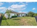 Large backyard with grassy lawn and privacy fence at 6442 Maiden Sea Dr, Apollo Beach, FL 33572
