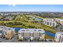 An aerial view shows the condominiums are close to golf course and scenic landscapes at 960 Starkey Rd # 7103, Largo, FL 33771