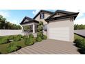 Home with a large garage and a walkway at 3305 W Oak Ave, Plant City, FL 33563