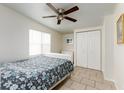 Bedroom with double bed, ceiling fan, and tiled floor at 331 25Th S St, St Petersburg, FL 33712