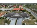 Aerial view showcasing the community and the home's location at 1601 Woodmar Dr, Sun City Center, FL 33573