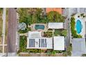 Property features a pool, solar panels, and lush landscaping at 220 14Th N Ave, St Petersburg, FL 33701